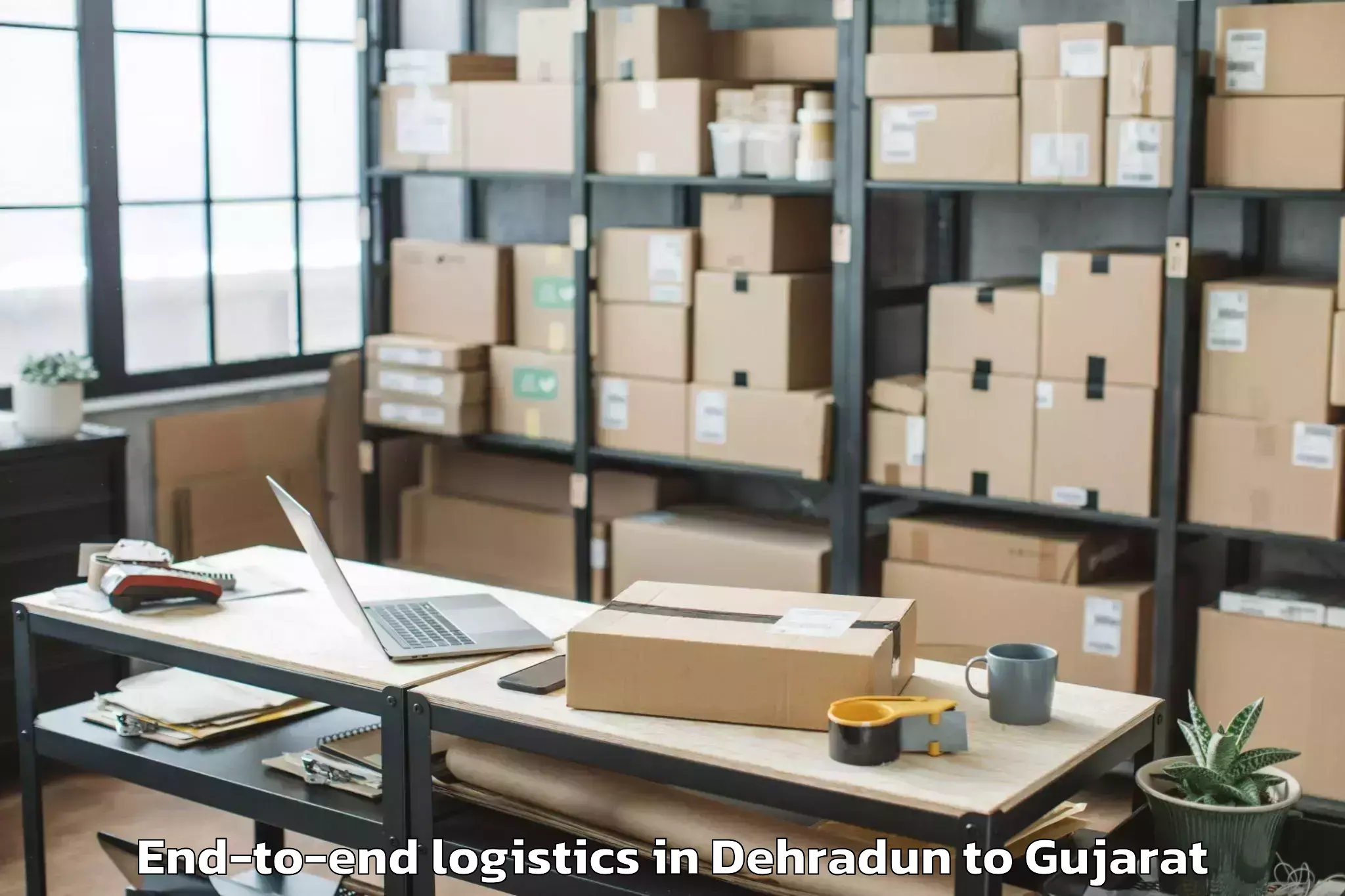 Book Dehradun to Satlasana End To End Logistics Online